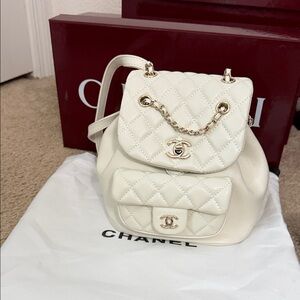CHANEL Cream Quilted Leather Backpack with Gold-Tone Chain